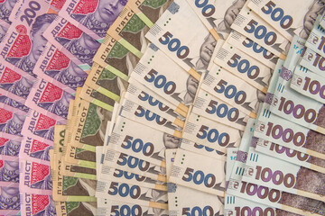 new ukrainian money. 200 500 and 1000 banknote as background. uah.