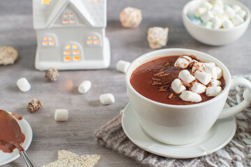 A cup of hot chocolate with marshmallows