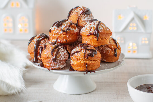 
Sweet deep fried small homemade balls donuts on a platter