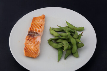 fresh salmon fish with edamame side