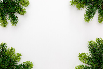 Fototapeta na wymiar Fir branches border on white background, christmas backdrop