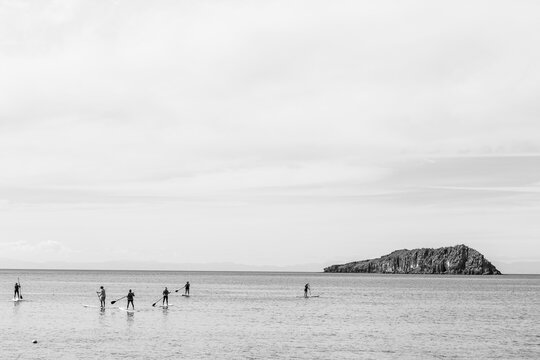 Stand-up paddlers on the Sea of Cortes, also known as the Gulf of California, Mexico.