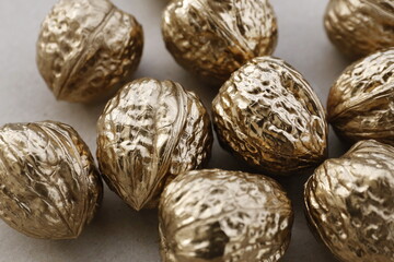 walnuts painted gold color for new year card