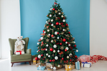 New year interior with Christmas tree with gifts decor garland December