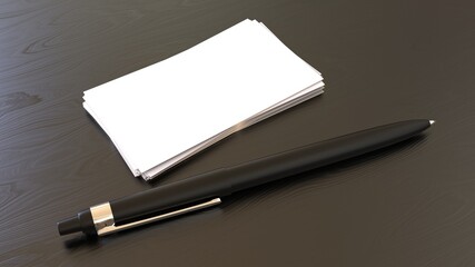 pen and business cards on wood table