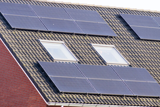 Solar panels on a brown roof for electric power generation