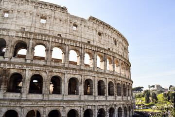 Fototapeta na wymiar Colosseum, the icon of Rome, in a beautiful sunny Easter sunday.