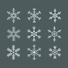Naklejka na ściany i meble Vector set of differently shaped snow flakes