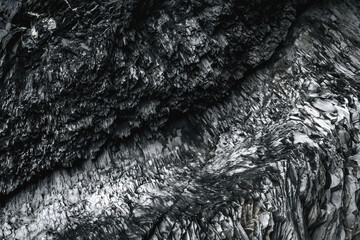 Abstact patterns of basalt pillars in the Hálsanefshellir Sea Cave on Reynisfjara Beach, Vik, Iceland