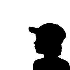 Silhouette face boy in baseball cap closeup