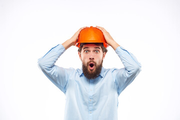 engineer in orange safety helmet in construction emotions professional lifestyle