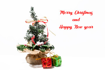 An Arrangement of Christmas Decorations and a Gift Box. White Christmas background. Copy space.