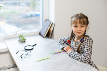 Little School Girl Doing Homework