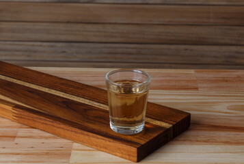 Cup of Cachaça or Pinga, a traditional Brazilian drink made from sugar cane.