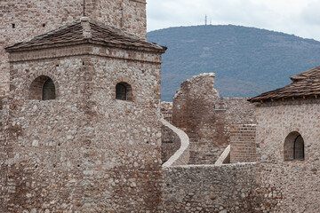 Close-up view of Momcilov grad fortress in Pirot, Serbia and background mountain peak Crni vrh with antenna towers