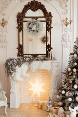 Christmas tree by the fireplace. home decoration for Christmas and new year. High quality photo