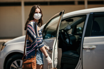 Girl shopping with mask and gloves during covid 19 corona virus crisis