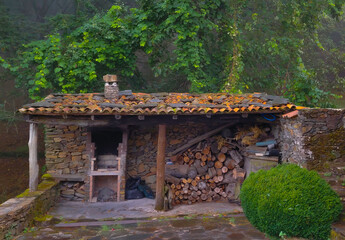 Outbuilding near a house in a mountain village