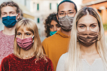 Urban crowd wearing face mask walking on the street - New normal concept with worried people...