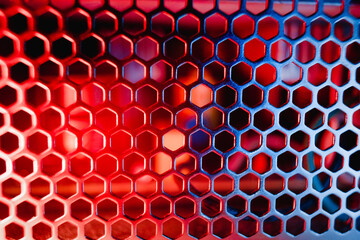 Power supply grill Electronics technology concept details blue red light background free space for...