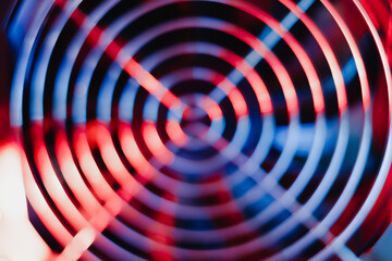 Power supply cooler Electronics technology concept details blue red light background free space for...