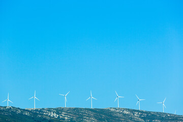Mountainside with a windmills in the Mediterranean