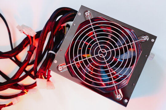 Power supply Electronics technology concept white background details blue red light