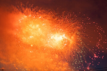 beautiful, multi-colored,large, bright fireworks on a holiday at night in the city
