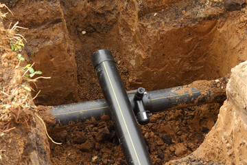 Extension of underground PVC water pipeline in pit