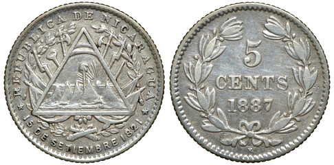 Nicaragua Nicaraguan silver coin 5 five centavos 1887, radiant liberty cap above mountains in sea all within triangle, military paraphernalia behind, denomination and date within wreath,