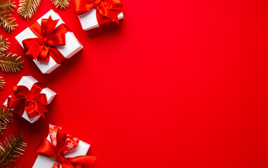 Merry Christmas and Happy Holidays greeting card, frame, banner. New Year. Noel. Christmas ornaments and gift on red background top view. Winter xmas holiday theme. Flat lay	
