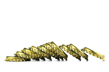 Golden bottle caps isolated on white background