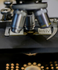 Fototapeta na wymiar close-up front view of an HIV sample as it is being analyzed under a laboratory microscope.