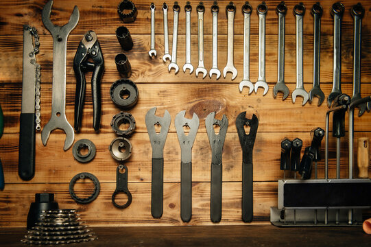 Set of tools on the wooden rack