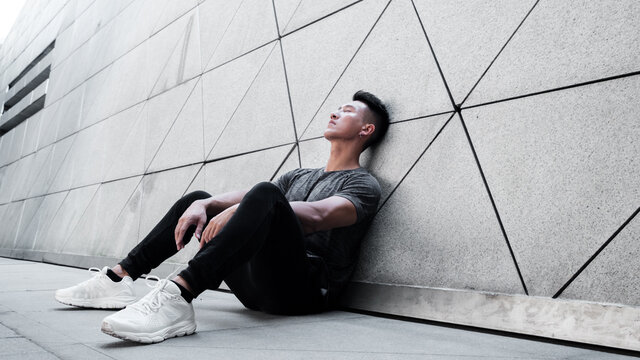 A Chinese man is exercising in the city