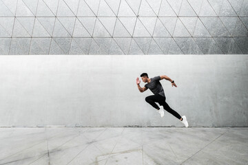 A Chinese man is exercising in the city