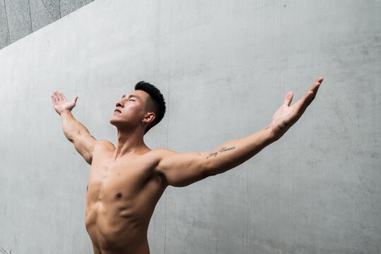 A Chinese man is exercising in the city