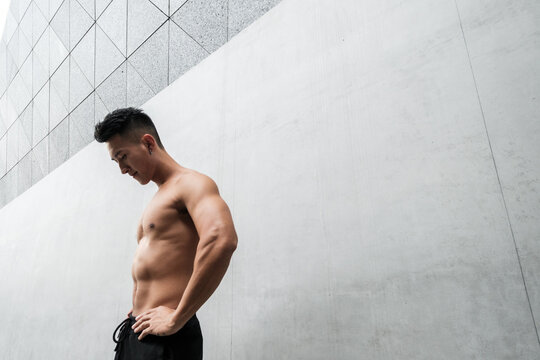 A Chinese man is exercising in the city