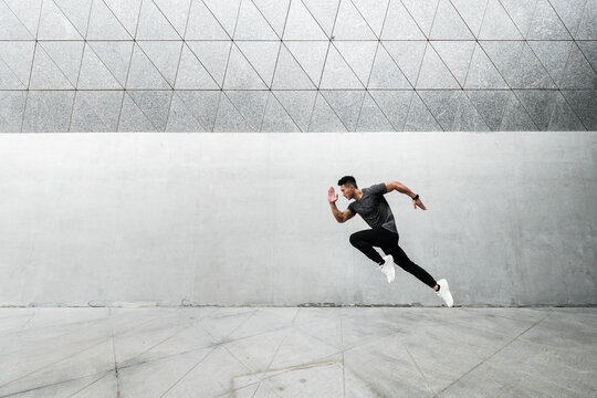 A Chinese man is exercising in the city