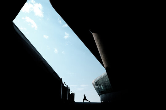A Chinese man is exercising in the city