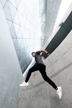 A Chinese man is exercising in the city
