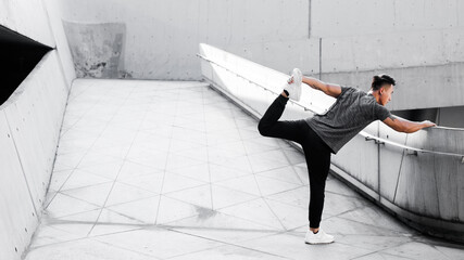 A Chinese man is exercising in the city