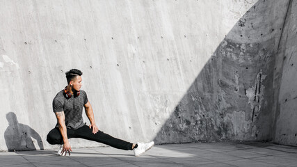 A Chinese man is exercising in the city