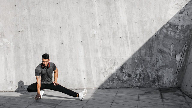 A Chinese man is exercising in the city