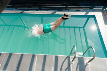 summer vibes - diving into the pool with splashes