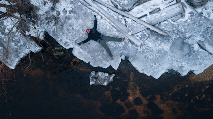 Young man on a melting ice floe