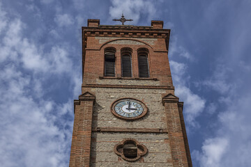Gothic style Catholic parish Saint Joseph Church. Like other monuments of city - statue of Saint Joseph located on its porch, as well as its bells are oldest in Perpignan. Pyrenees Orientales, France.