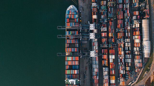 Mexican port in Manzanillo - large ocean cargo ship near the dock - Powered by Adobe