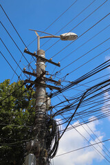 Accumulation of electrical wires on a pole for street light