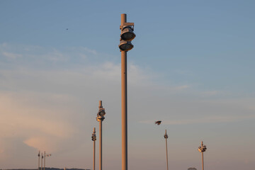 Beautiful street lamps against the blue sky with white clouds on golden hour